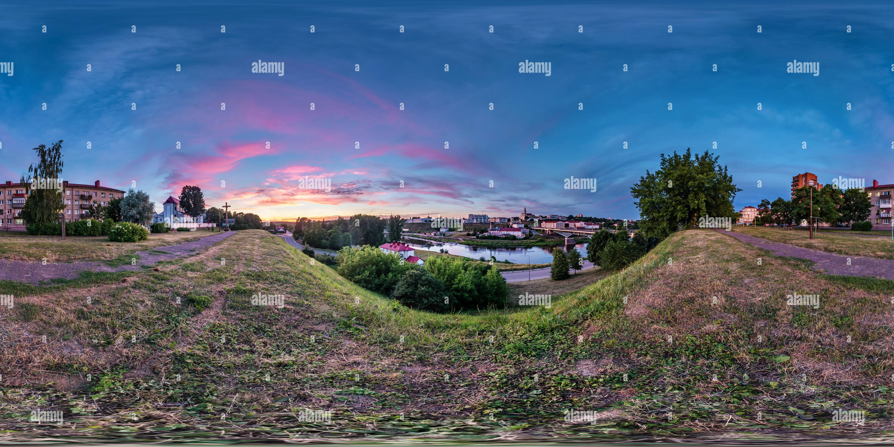 360 degree panoramic view of full seamless spherical hdri panorama 360 degrees angle view on bank of wide river overlooking old city in sunset with beautiful clouds in equirectang