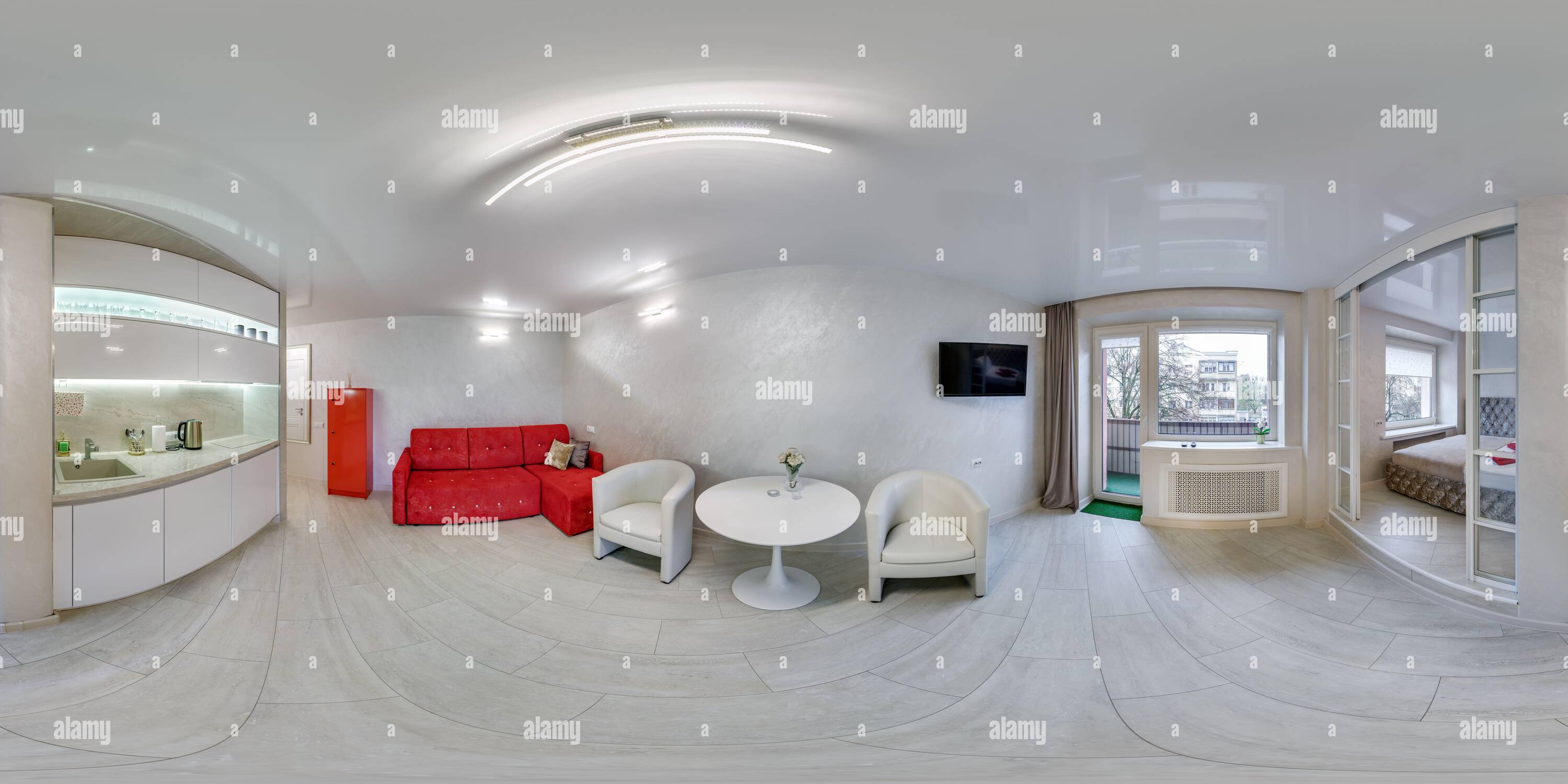 Visualizzazione panoramica a 360 gradi di panorama hdri 360 completo all'interno del soggiorno con cucina in appartamento monolocale con tavolo e tv con divano rosso in spher equirettangolare