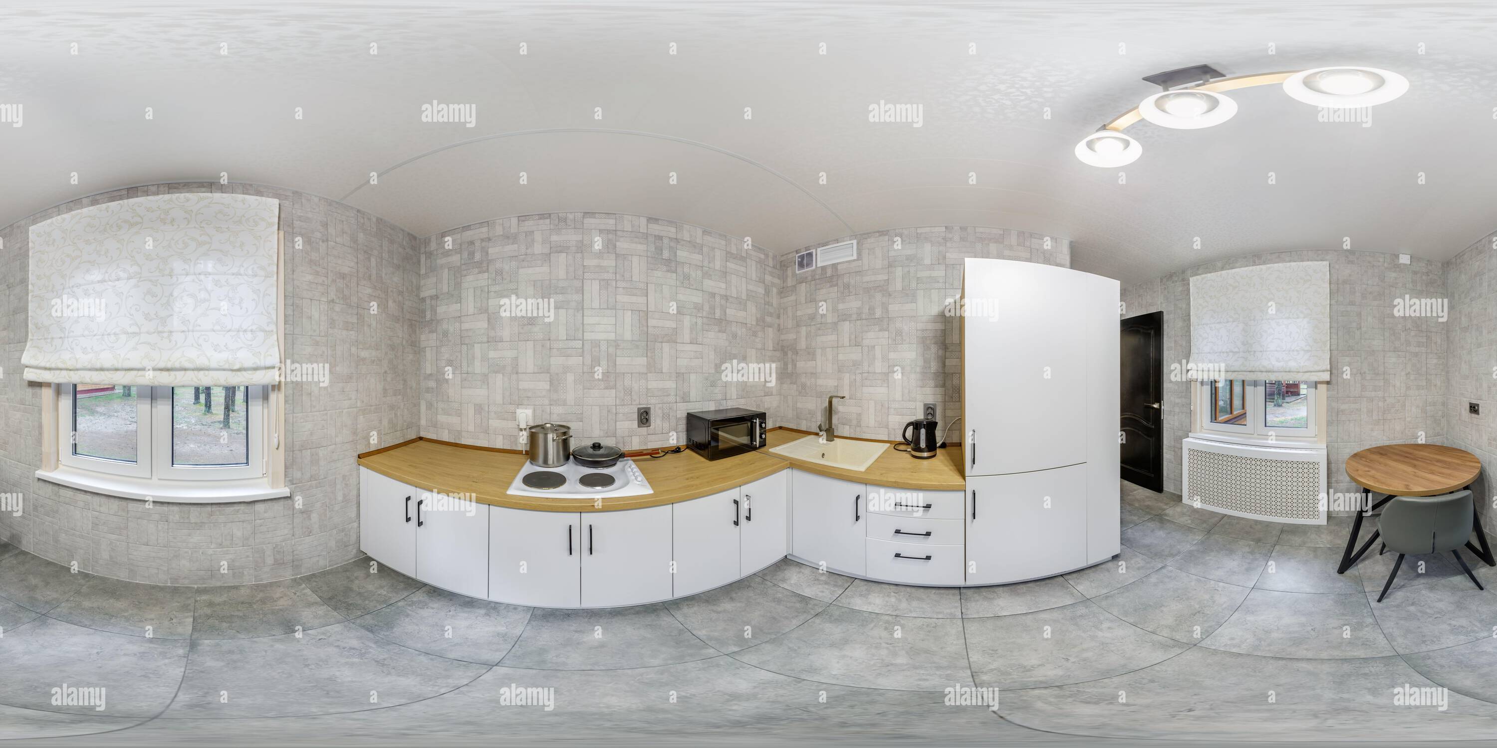 Visualizzazione panoramica a 360 gradi di senza giunture 360 panorama all'interno della cucina di hotel economico, appartamento o appartamenti con sedie e tavolo in proiezione equirettangolare con zenith e n